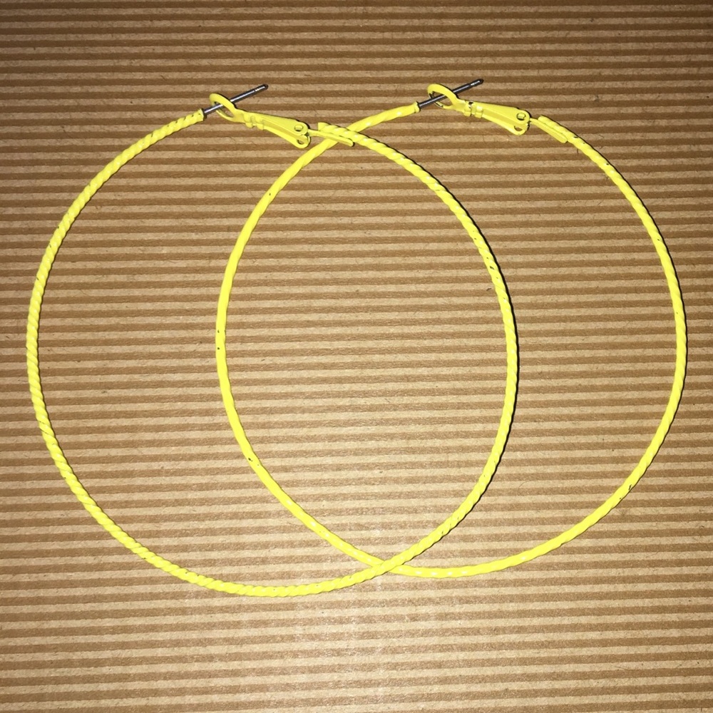 Bright yellow hoop earrings